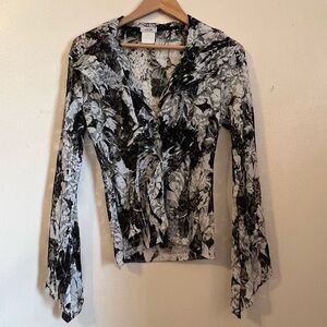 Cadie blouse black and white lace with ruffles on front sleeves diagonal, size L